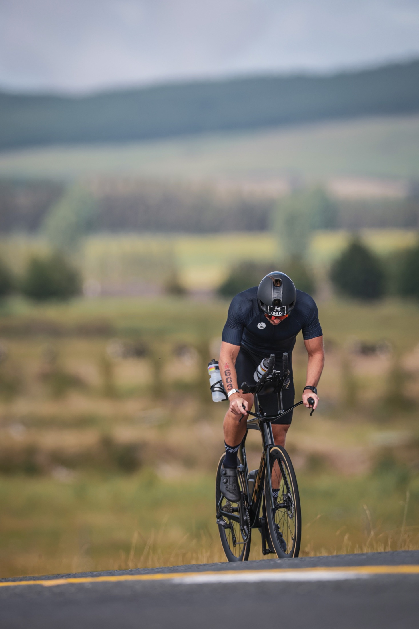 Peter Holst Jacobsen racing on the bike during Ironman New Zealand